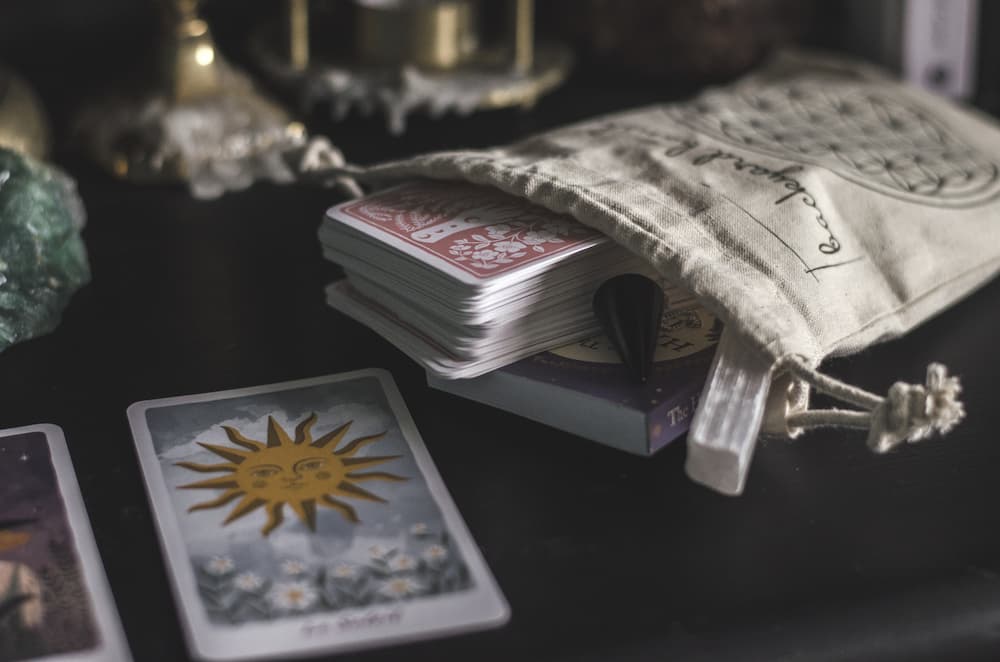 tarot cards stored in a divination pouch