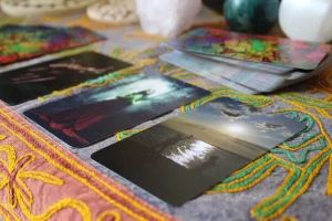tarot cards with crystals in the background